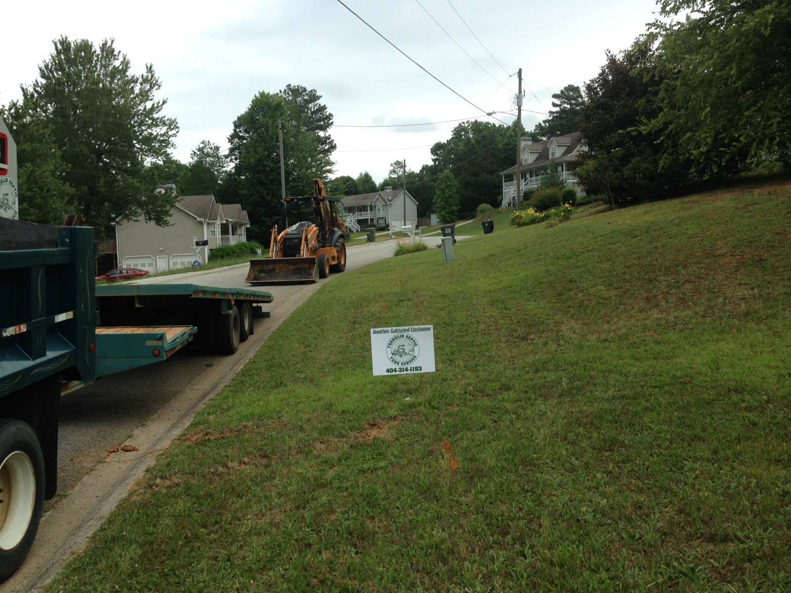 Franklin Septic Tank Service truck at a job site